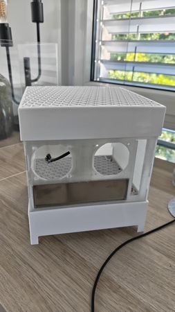 The very first prototype – white PETG frame with fan openings