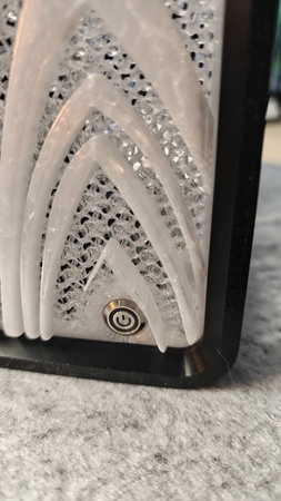 White tile with rhinestone appliqué